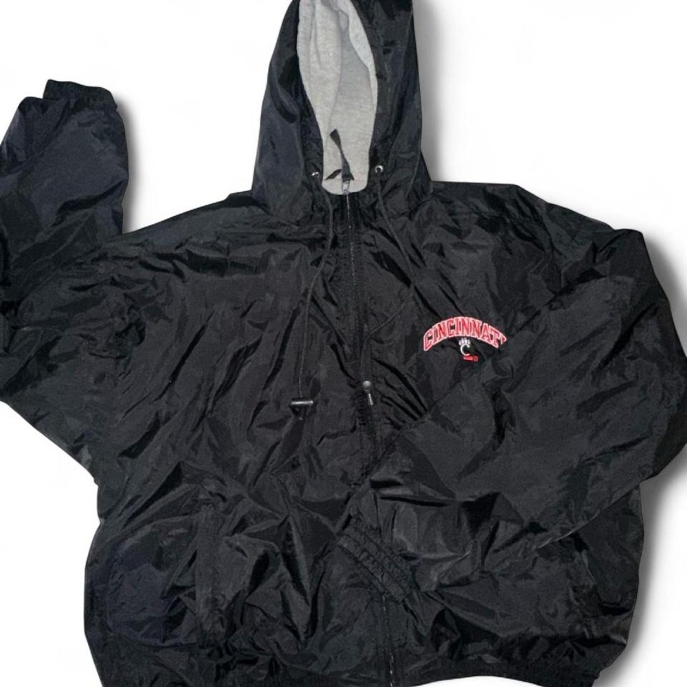 Black Cincinnati Bearcats windbreaker jacket with red embroidered logo, size L.